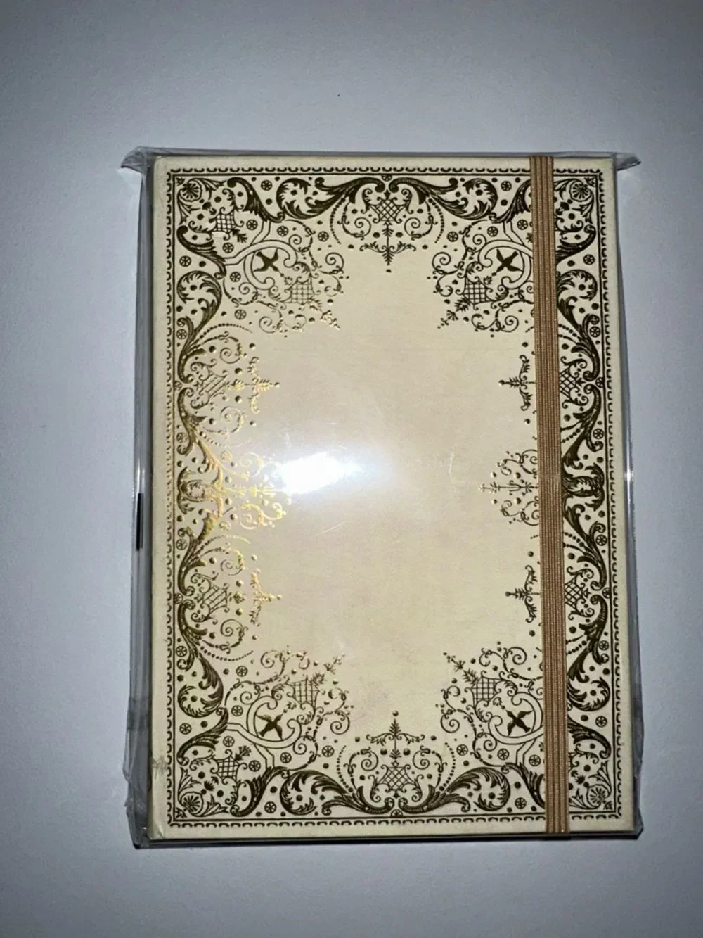 Gilded Ivory gold-foiled embossed cover gilded pages elastic closure journal